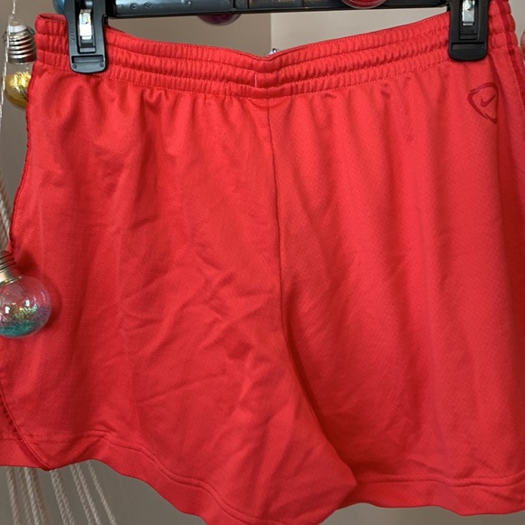 2/$15 Nike- Women’s Medium dri-fit Salmon shorts - Picture 2 of 5